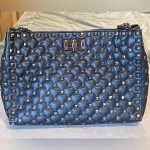 Black and silver studded handbag